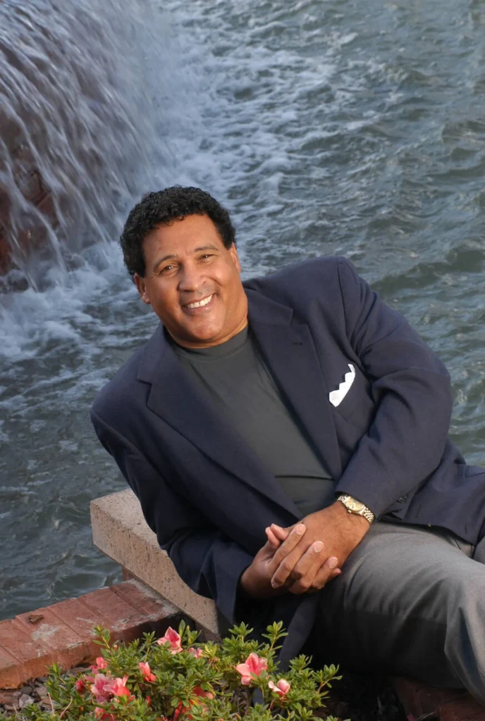 Greg Gumbel calling a Super Bowl game as the first African American play-by-play announcer