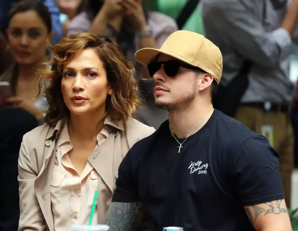 Jennifer Lopez walking with her new boyfriend in a casual outing, looking happy and relaxed.