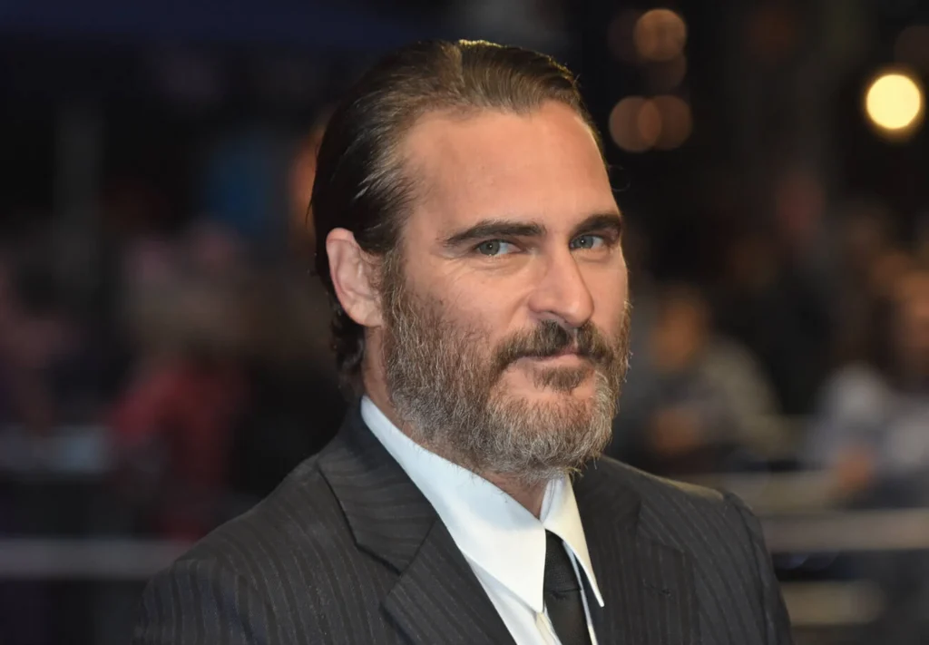 A striking portrait of Joaquin Phoenix, showcasing his intense gaze and iconic features, reflecting his joaquin phoenix net worth of $80 million and dedication to transformative roles