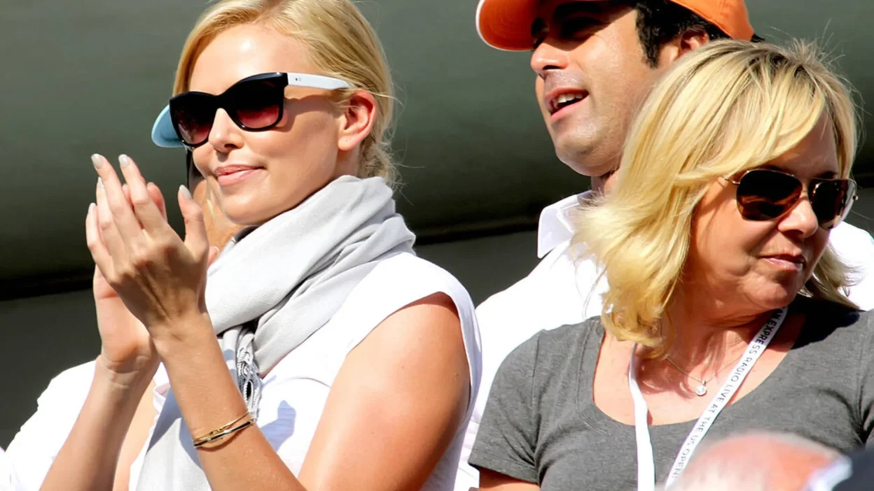 Charlize Theron and her mother Gerda Theron enjoying the 2010 US Open men's finals match, seated in the stands