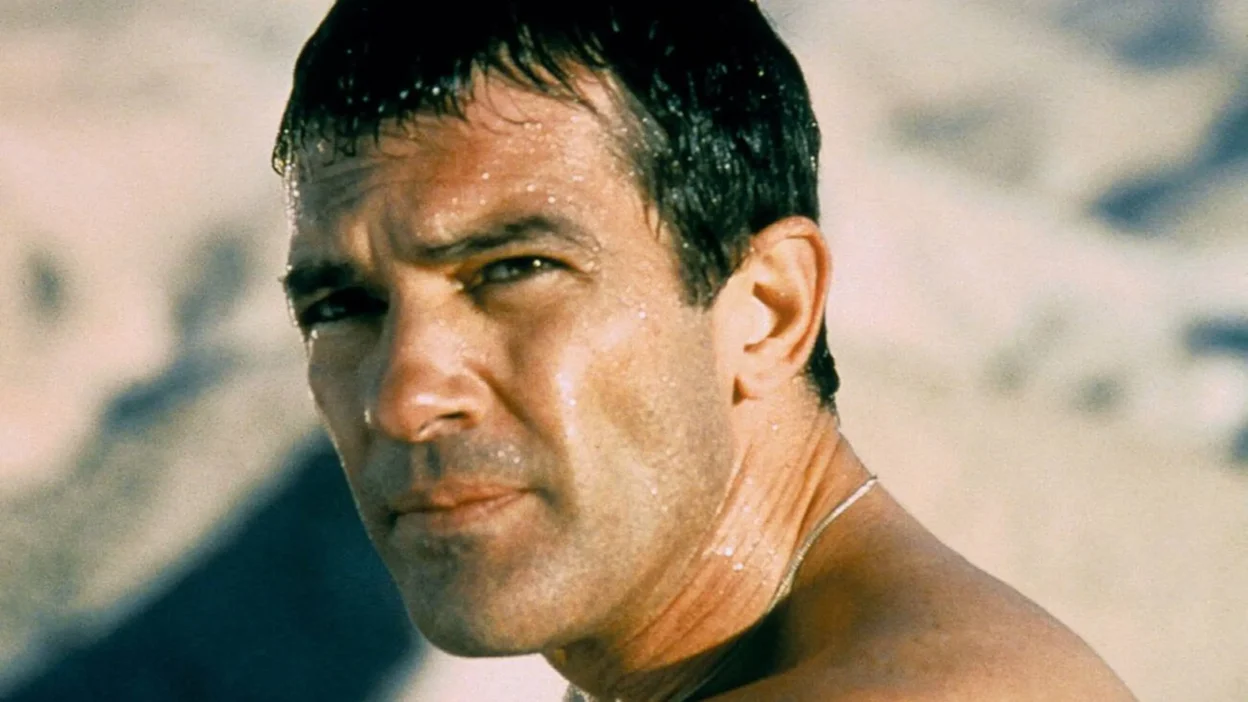 Antonio Banderas in a pivotal scene from The Body (2001), playing a priest caught in a thrilling mystery surrounding a historic discovery